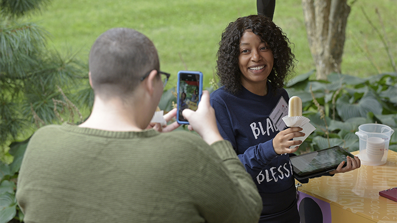 Two people talking at an event