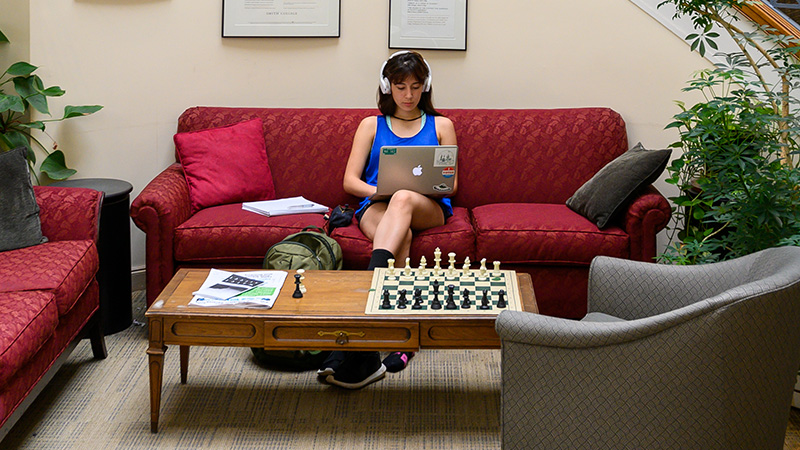 Student writing in the Jacobson Center