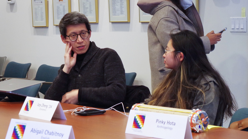 Yanlong Guo and Izzy Zheng engaged in conversation