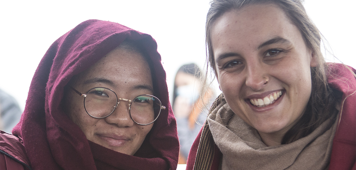 Student posing with nun