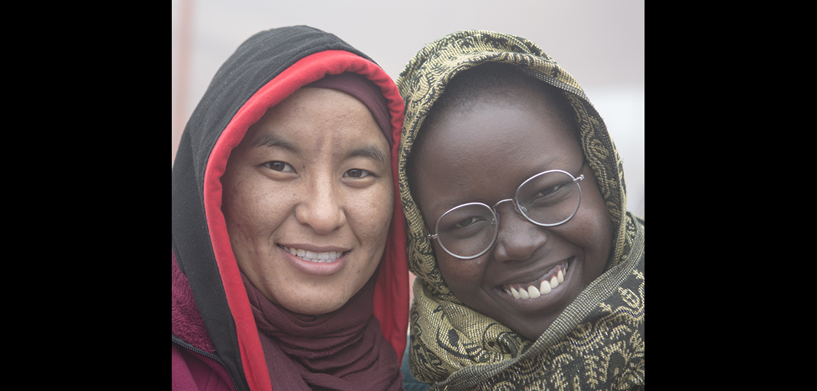 Student posing with nun