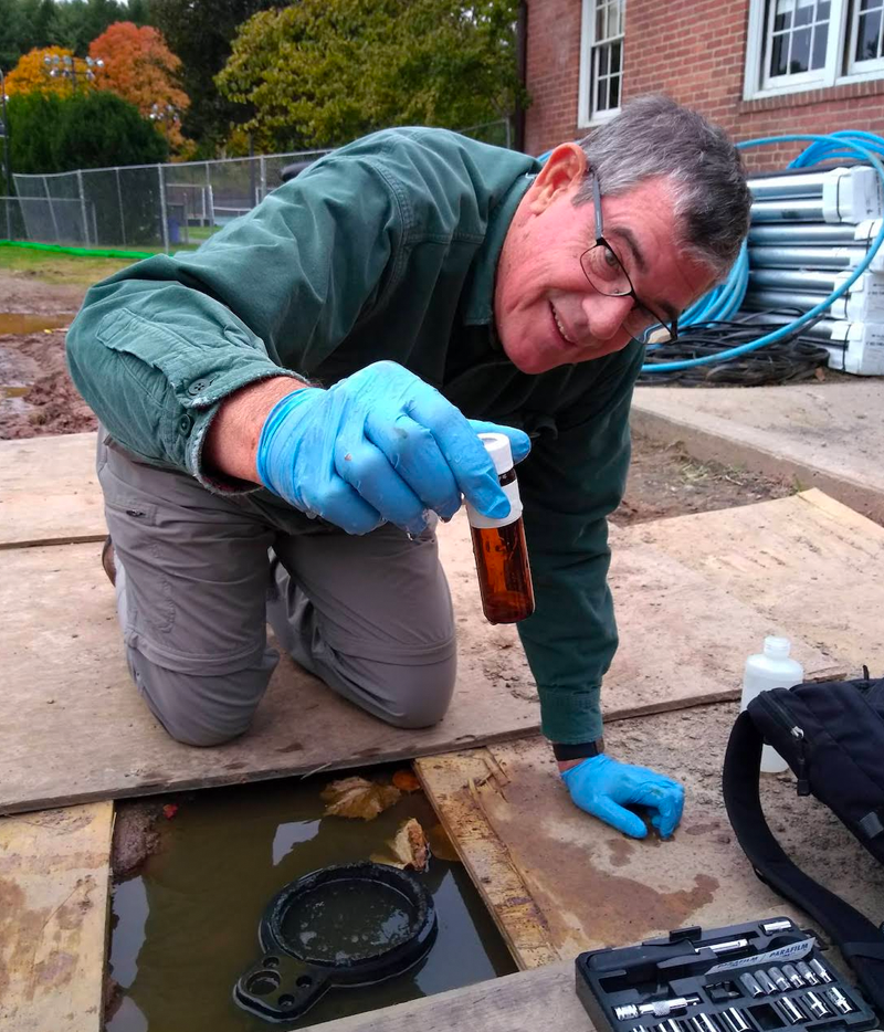 Professor Bob Newton performing water tests