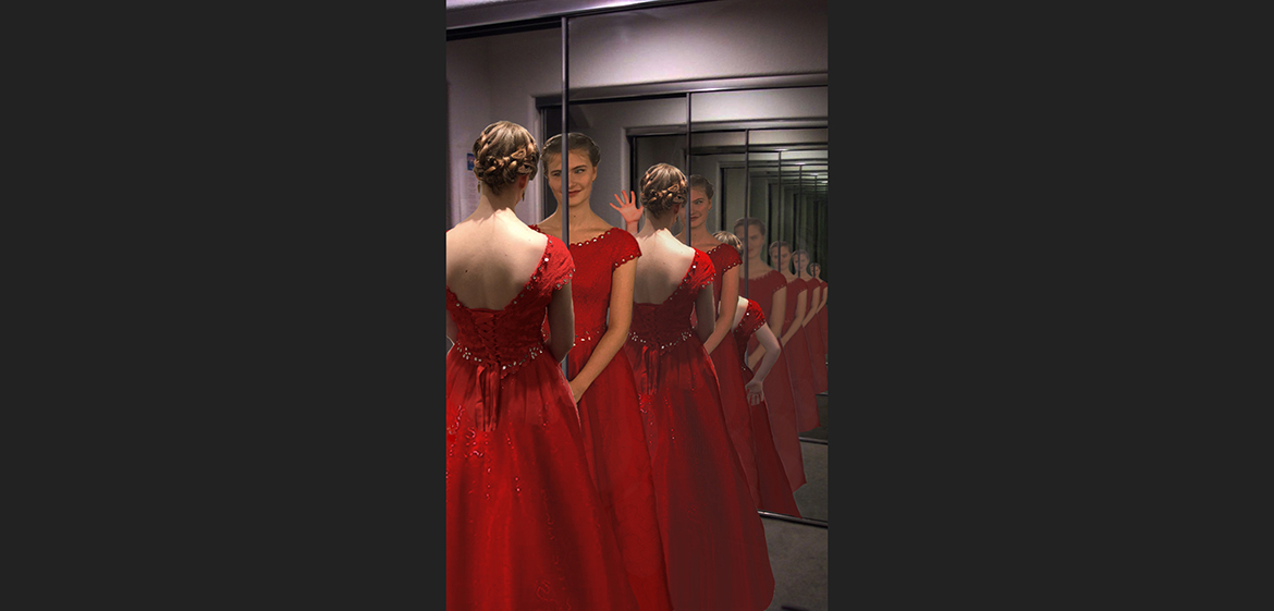 "Through the Looking Glass" photo of woman looking in a mirror created by Sophia Hager ’21.