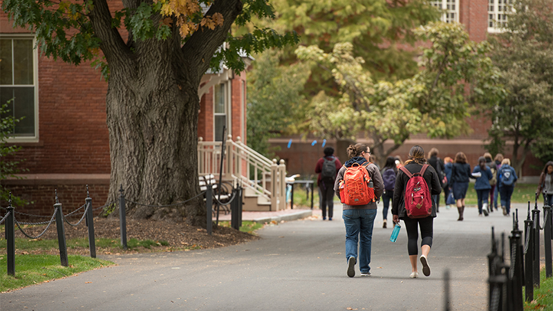 Students walking outside on campus