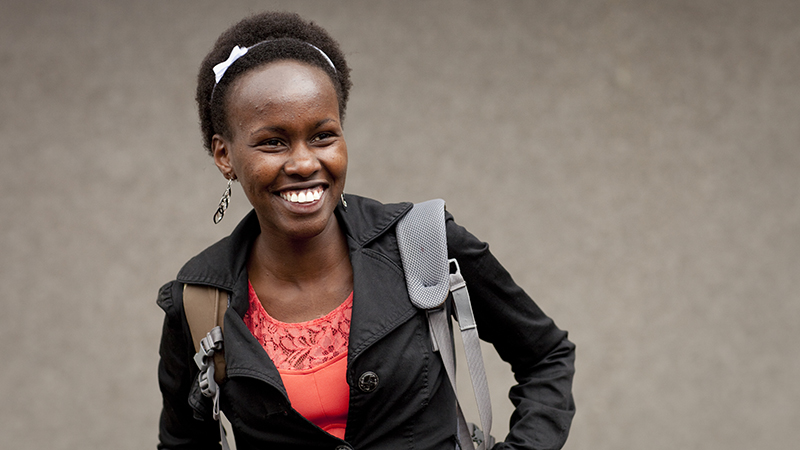 Cynthia Masai, from Kenya, smiles off-camera