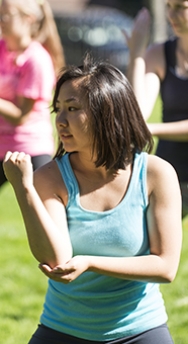 Student engaged in a self-defense class