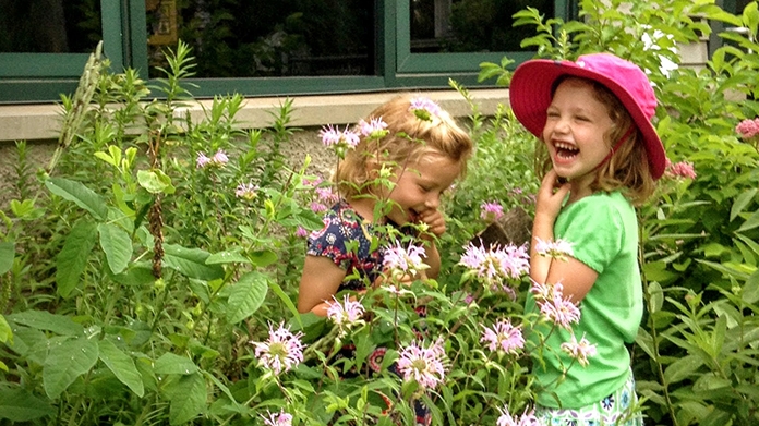 Two girls in a garden