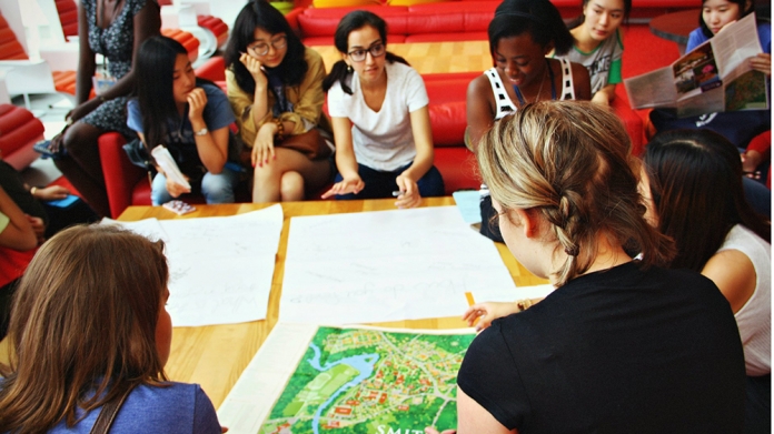New Smith students gather around a campus map
