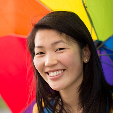 Leigh Johnston holding an umbrella