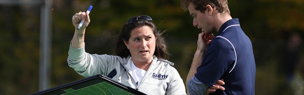 Smith College coaches discuss strategy on the field