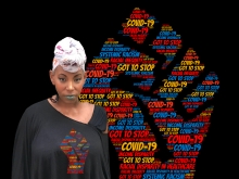 Erika Ewing standing in front of a black power fist assembled from a covid-19 wordcloud. She is wearing a shirt with the same image.