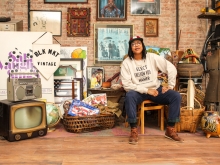 Jannah Handy in her store BLK MKT Vintage, surrounded by African American historical items