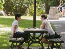 two people at a picnic table