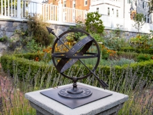 metal globe and sundial