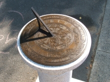 Bronze sundial on a granite pedestal