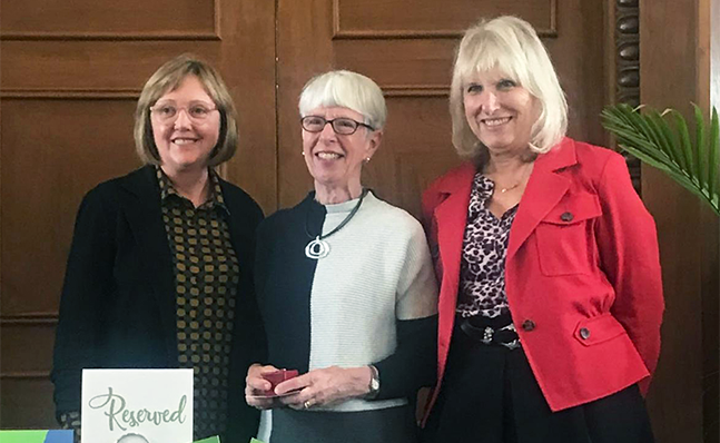 President Kathleen McCartney; Mary Grant ’70; Susan Greene ’68, President of the Alumnae Association Board of Directors