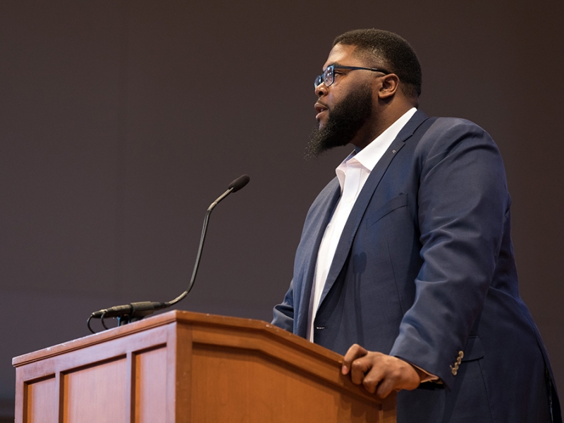 Author Tony Jack at the podium for the Inclusion in Action conference