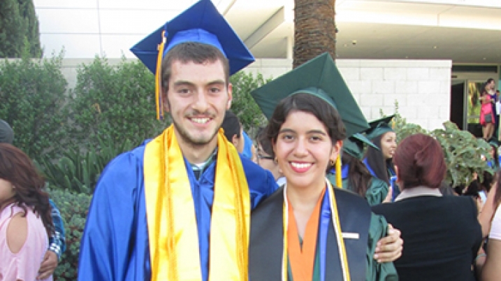 Woman and her brother on graduation day