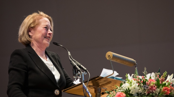 Niki Tsongas speaking at the podium